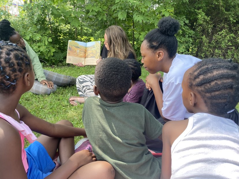 A group of students reading in circle
