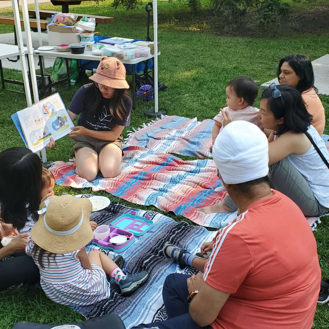A volunteer reading a book